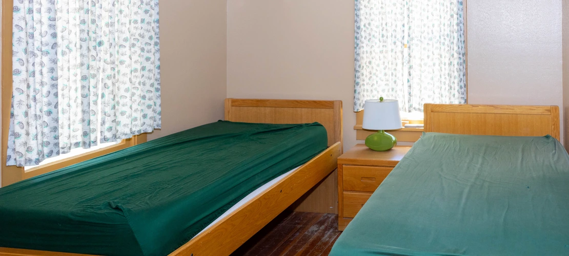 Sleeping quarters with two twin beds in SRER lower cabin