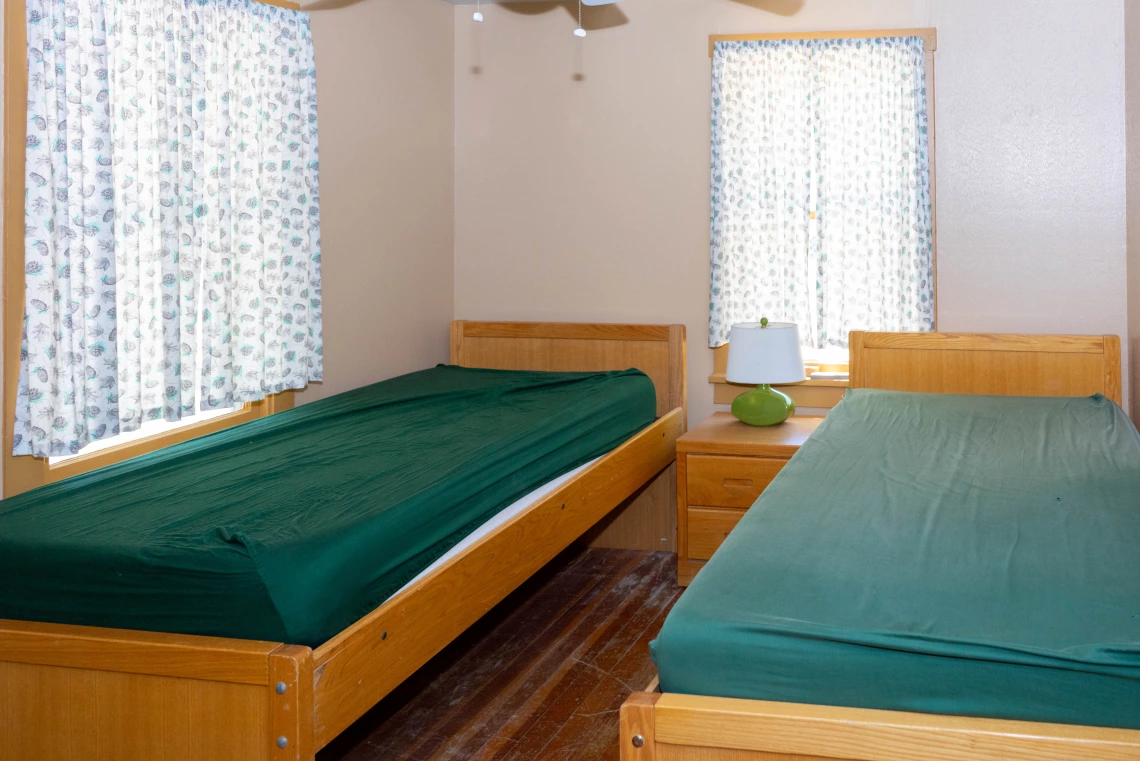 Sleeping quarters with two twin beds in SRER lower cabin