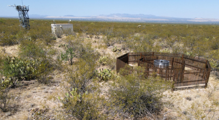 NEON’s Double Fence Intercomparison Reference gauge (foreground) and the instrument hut and flux tower