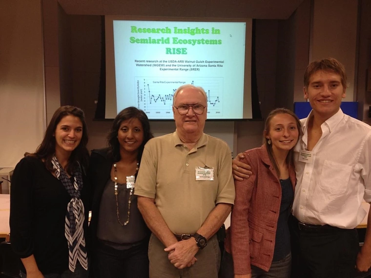 Poster contest winners (from left) Amber Dalke , Zulia Mayari Sanchez Mejia, Kelsey Hawkes and Evan Kipnis flank contest sponsor Malcolm McGregor after the 9th Annual RISE Symposium on 13 October 2012