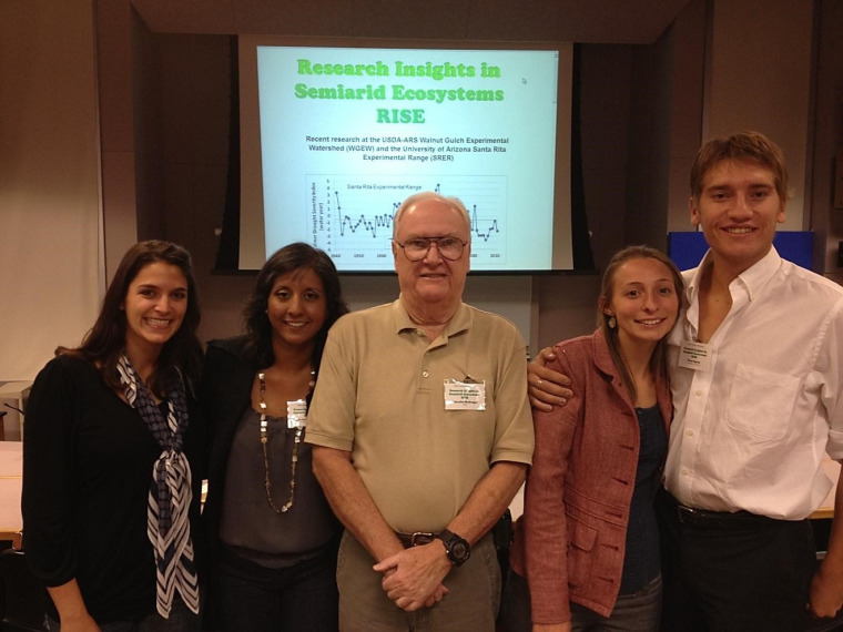 Poster contest winners (from left) Amber Dalke , Zulia Mayari Sanchez Mejia, Kelsey Hawkes and Evan Kipnis flank contest sponsor Malcolm McGregor after the 9th Annual RISE Symposium on 13 October 2012