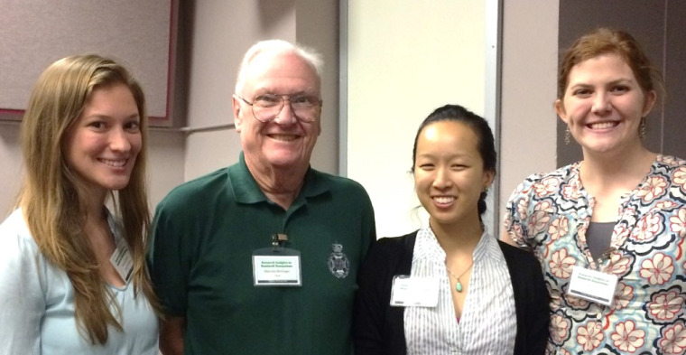 Poster contest winners (from left) Natasha Krell, Malcolm McGregor (contest benefactor), Daphne Szutu, and Gayle Frost after the 11th Annual RISE Symposium on 18 October 2014. Rachel Wehr is missing from this photo.