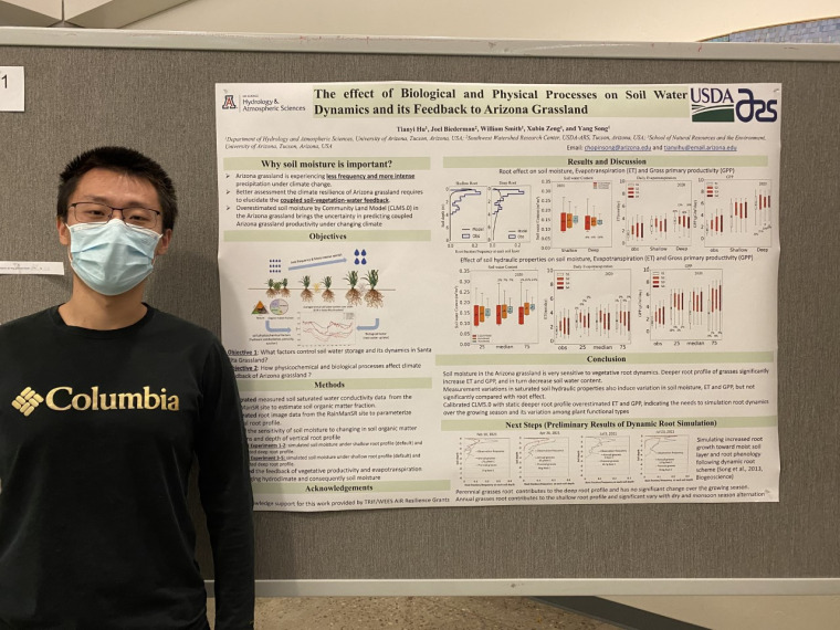 Tianyi Hu in front of his poster