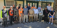 Representatives from the Southern Arizona chapter of Quail Forever, UA Santa Rita Experimental Range, UA Wildlife Ecology and Management, and Arizona Game and Fish Department standing in front of the conference room at the Florida Station